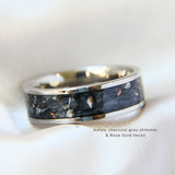 Sterling silver band, lightly  sprinkled ashes, charcoal grey shimmer, subtle rose gold flecks ( flat band is custom order)