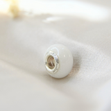 Breastmilk bead with pearl white shimmer