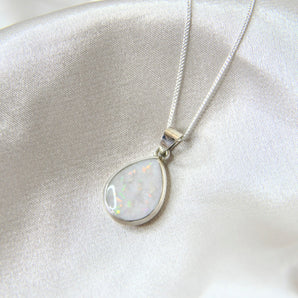 Breastmilk, pearl white shimmer and white crushed opal (heavy)