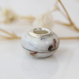 Milk, umbilical cord and hair, pearl white shimmer subtle opalescent flecks