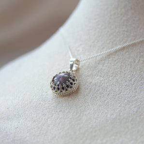 Ashes, violet shimmer and silver flecks