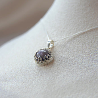 Ashes, violet shimmer and silver flecks