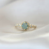 Milk, hair, light blue shimmer, sublte gold fleck, aquamarine/mint opal