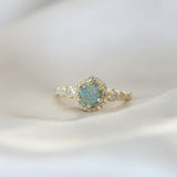 Milk, hair, light blue shimmer, sublte gold fleck, aquamarine/mint opal -Old design ( stone is for colour inspiration only)