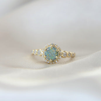 Milk, hair, light blue shimmer, sublte gold fleck, aquamarine/mint opal