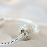 Pearl white shimmer, heavy ashes, heavy gold fleck