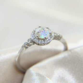 Ashes ring with pearl white shimmer and opalescent flecks