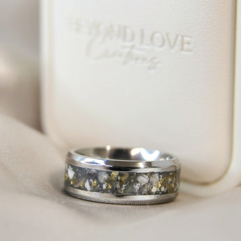 Titanium wide band ring with heavy ashes, charcoal grey shimmer and heavy gold flecks