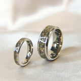 Titanium Matching narrow and wide band keepsake rings with cremations and crushed white opal