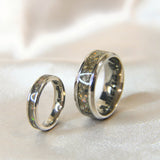 Titanium Matching narrow and wide band keepsake rings with cremations and crushed white opal