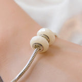 Faceted keepsake beads