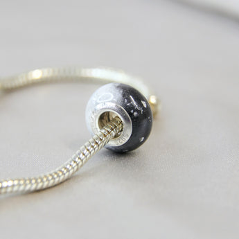 Breastmilk, subtle silver flecks, black and pearl white shimmer