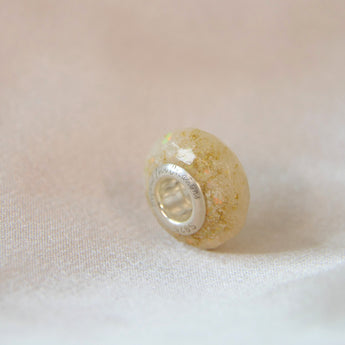Breastmilk, gold flecks and white opal