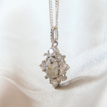 Heavy sprinkled ashes, crystal white shimmer, subtle silver flecks