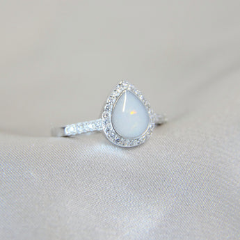 Breastmilk, pearl white shimmer and opalescent flecks