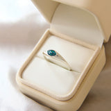 Forest green shimmer, light ashes, ocean green opal, opalescent flecks subtle