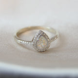 Pearl white shimmer, lightly sprinkled ashes, heavy opalescent flecks, heavy white opal