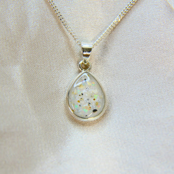 14 x 10 silver with pearl white shimmer, heavy ashes, subtle silver flecks and white opal