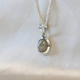 Heavy ashes, pearl white shimmer 8mm pendant