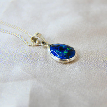 14 x 10 silver with Sapphire blue shimmer, embryo sack/blood and subtle opalescent fleck