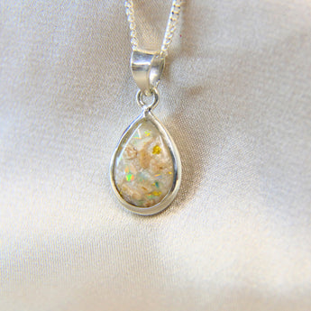 14 x 10 silver with pearl white shimmer, heavy sprinkled ashes, subtle gold flecks & aquamarine opal