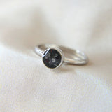 Black shimmer, lightly sprinkled ashes, black opal ( red reflections)