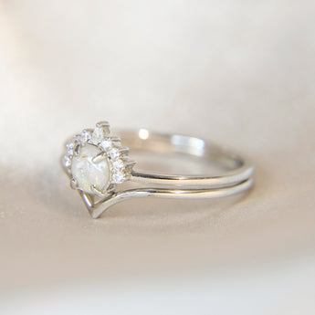 Lightly sprinkled ashes, pearl white shimmer, subtle opalescent flecks