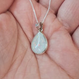Breastmilk, pearl white shimmer and white crushed opal (heavy)