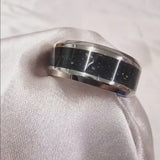Titanium band, lightly sprinkled ashes and black shimmer