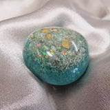 Teal shimmer, heavy ashes, white crushed opal and clients gold