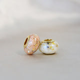 Gold beads, nude shimmer, heavy ashes, subtle gold flecks, white crushed opal
Gold bead, pearl white shimmer, lightly sprinkled ashes heavy gold flecks