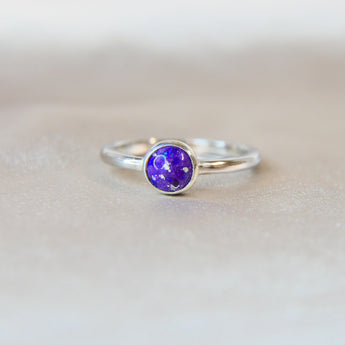 Violet shimmer, heavy ashes ( ashes are very fine), subtle silver flecks and purple opal