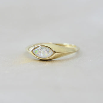 Gold marquise ring with pearl white shimmer, heavy ashes, and white opal