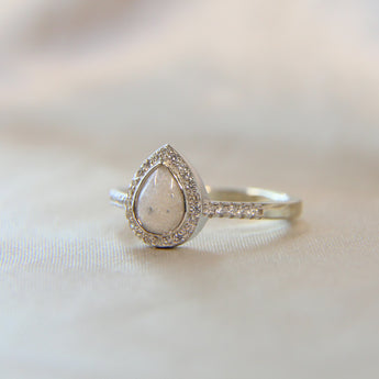 Milk, pearl white shimmer, subtle silver flecks