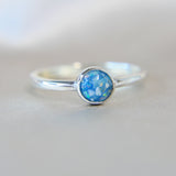 Light blue shimmer, heavy ashes, white crushed opal