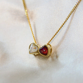 Yellow gold hearts, lightly sprinkled ashes, pearl white shimmer, subtle Opalescent flecks, red shimmer