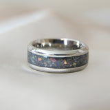 Titanium band, charcoal grey shimmer, subtle rose gold flecks, white opal, heavy ashes