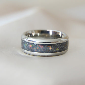 Titanium band, charcoal grey shimmer, subtle rose gold flecks, white opal, heavy ashes