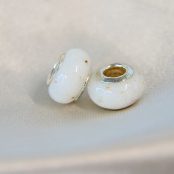 Silver beads, milk, subtle umbilical cord and pearl white shimmer