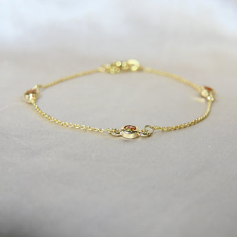 Gold bracelet, heavy ashes, ruby red shimmer and heavy gold fleck