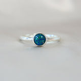 Forest green shimmer, cobalt blue opal, lightly sprinkled ashes
