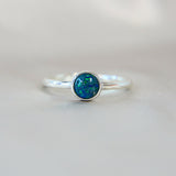 Forest green shimmer, cobalt blue opal, lightly sprinkled ashes