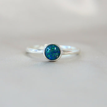 Forest green shimmer, cobalt blue opal, lightly sprinkled ashes