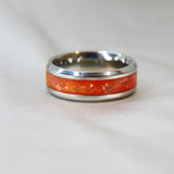 Titanium band, lightly sprinkled ashes, saffron orange shimmer
