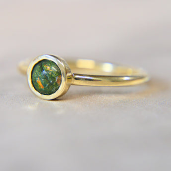 Gold band, olive green shimmer, hair, subtle opalescent flecks and heavy ashes