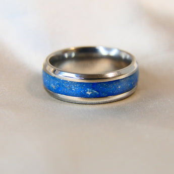 Titanium band, sapphire blue shimmer, heavy sprinkled ashes