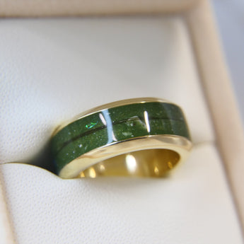 Yellow gold band, olive green shimmer, subtle opalescent flecks, hair, light ashes