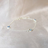 Light blue shimmer, heavy ashes and heavy opalescent flecks