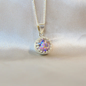 Heavy ashes, pearl white shimmer, heavy opalescent flecks and pink opal