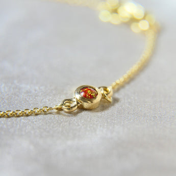 Gold bracelet, heavy ashes, ruby red shimmer and heavy gold fleck